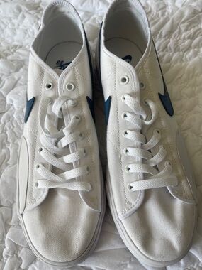 Nike White Canvas Sneakers with Navy Swoosh